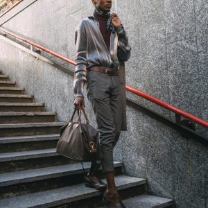 Stylish man going into subway station, Milan, Italy